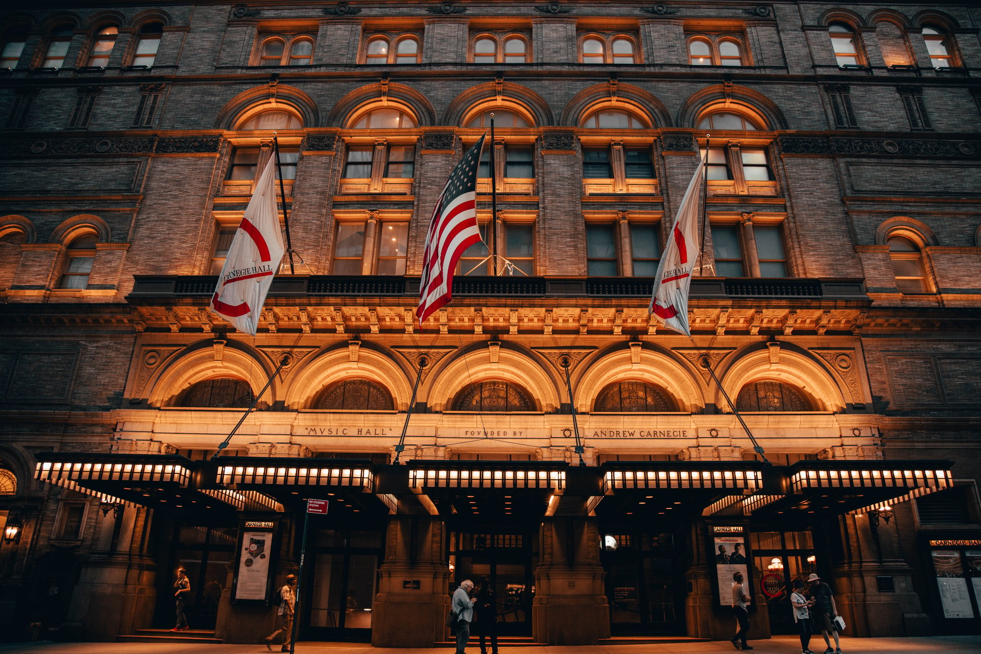 Carnegie Hall lit with a warm glow at night image by Jeremy Liebman